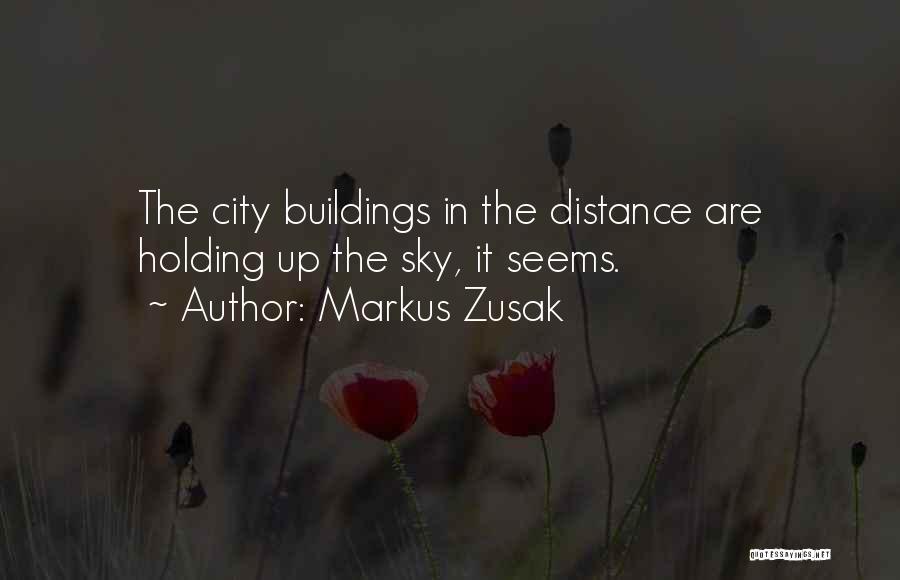 Markus Zusak Quotes: The City Buildings In The Distance Are Holding Up The Sky, It Seems.