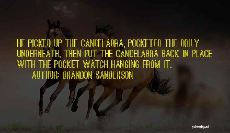 Brandon Sanderson Quotes: He Picked Up The Candelabra, Pocketed The Doily Underneath, Then Put The Candelabra Back In Place With The Pocket Watch