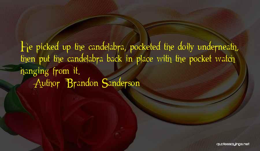 Brandon Sanderson Quotes: He Picked Up The Candelabra, Pocketed The Doily Underneath, Then Put The Candelabra Back In Place With The Pocket Watch