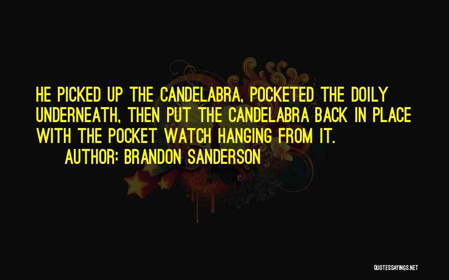 Brandon Sanderson Quotes: He Picked Up The Candelabra, Pocketed The Doily Underneath, Then Put The Candelabra Back In Place With The Pocket Watch