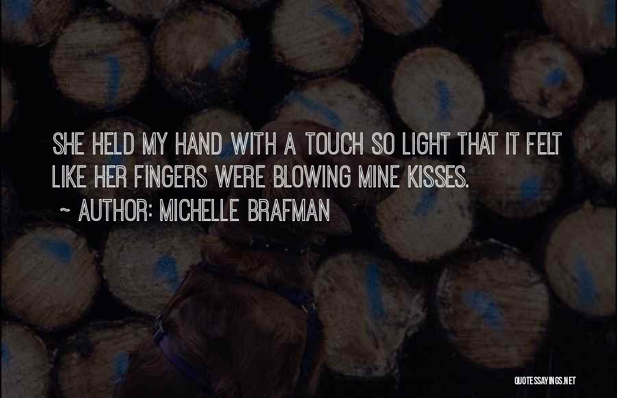 Michelle Brafman Quotes: She Held My Hand With A Touch So Light That It Felt Like Her Fingers Were Blowing Mine Kisses.