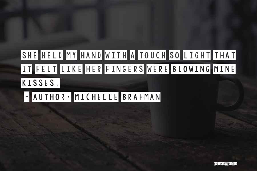 Michelle Brafman Quotes: She Held My Hand With A Touch So Light That It Felt Like Her Fingers Were Blowing Mine Kisses.