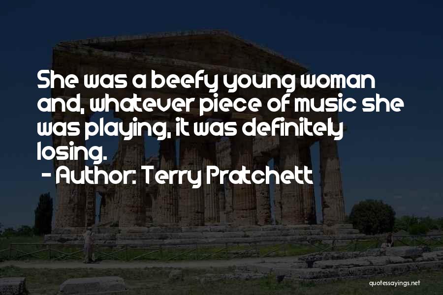 Terry Pratchett Quotes: She Was A Beefy Young Woman And, Whatever Piece Of Music She Was Playing, It Was Definitely Losing.