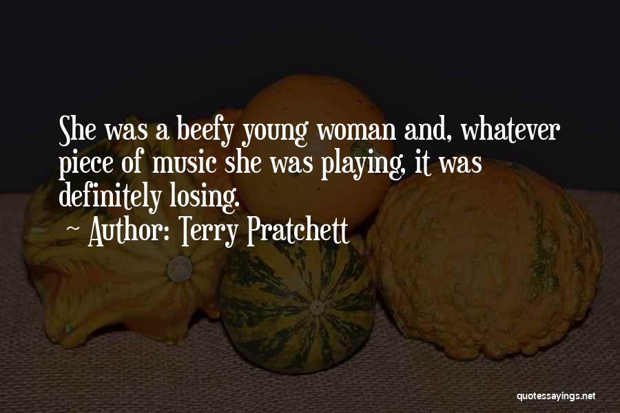 Terry Pratchett Quotes: She Was A Beefy Young Woman And, Whatever Piece Of Music She Was Playing, It Was Definitely Losing.