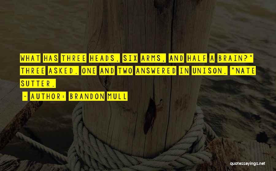 Brandon Mull Quotes: What Has Three Heads, Six Arms, And Half A Brain? Three Asked. One And Two Answered In Unison. Nate Sutter.