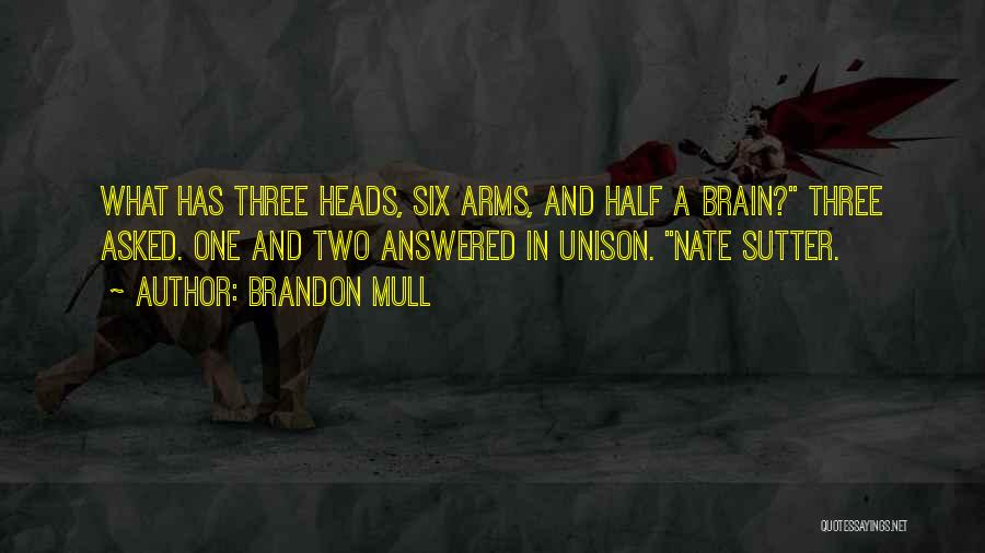 Brandon Mull Quotes: What Has Three Heads, Six Arms, And Half A Brain? Three Asked. One And Two Answered In Unison. Nate Sutter.