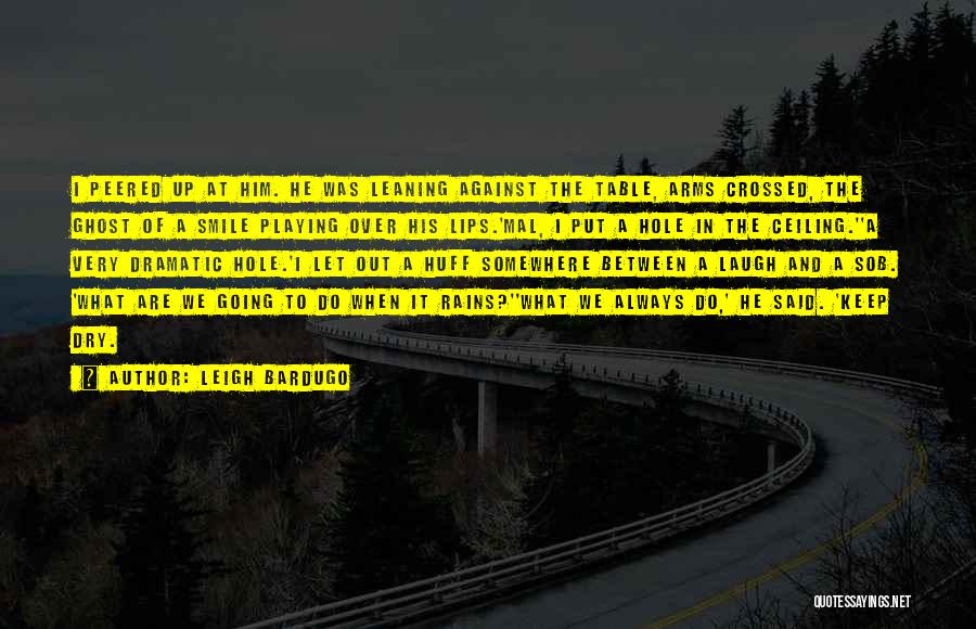 Leigh Bardugo Quotes: I Peered Up At Him. He Was Leaning Against The Table, Arms Crossed, The Ghost Of A Smile Playing Over