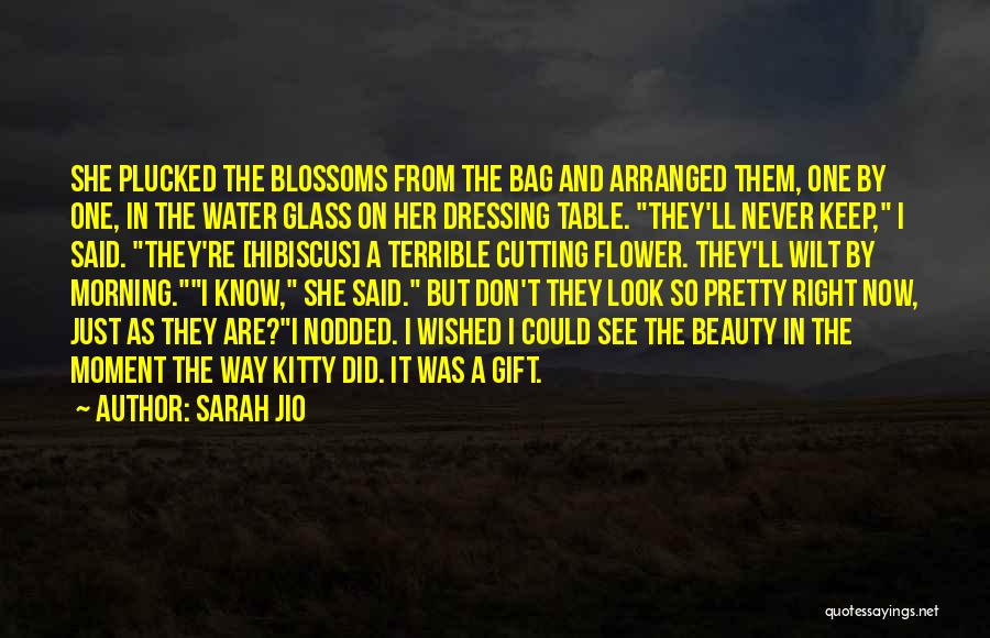 Sarah Jio Quotes: She Plucked The Blossoms From The Bag And Arranged Them, One By One, In The Water Glass On Her Dressing