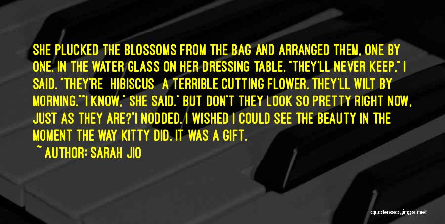 Sarah Jio Quotes: She Plucked The Blossoms From The Bag And Arranged Them, One By One, In The Water Glass On Her Dressing