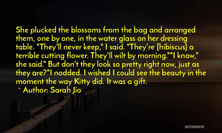 Sarah Jio Quotes: She Plucked The Blossoms From The Bag And Arranged Them, One By One, In The Water Glass On Her Dressing