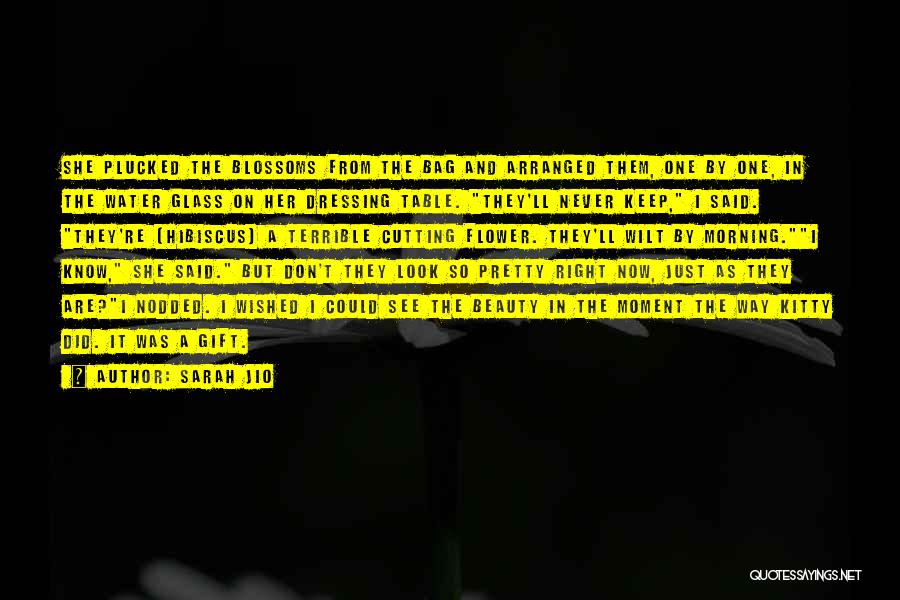 Sarah Jio Quotes: She Plucked The Blossoms From The Bag And Arranged Them, One By One, In The Water Glass On Her Dressing