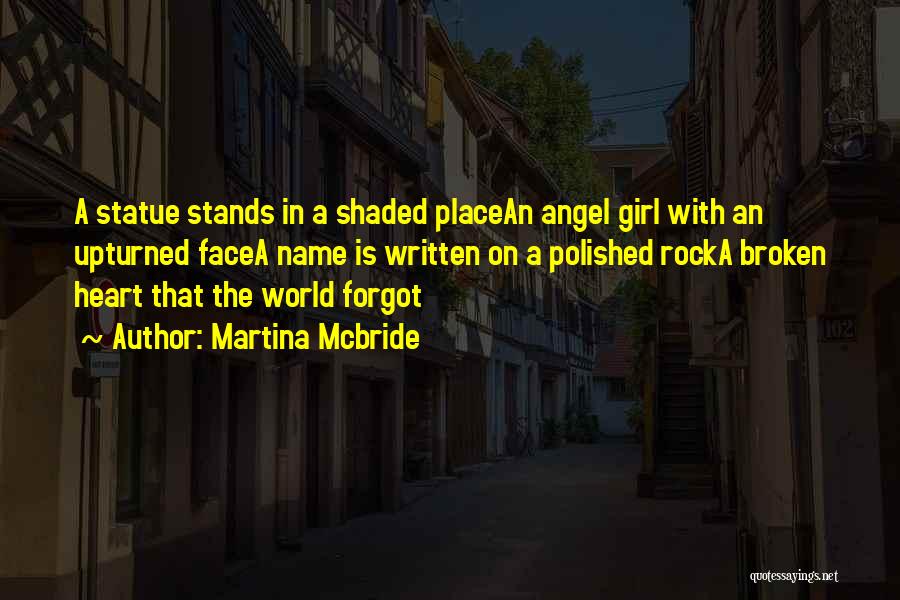 Martina Mcbride Quotes: A Statue Stands In A Shaded Placean Angel Girl With An Upturned Facea Name Is Written On A Polished Rocka