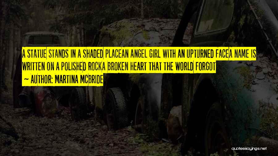 Martina Mcbride Quotes: A Statue Stands In A Shaded Placean Angel Girl With An Upturned Facea Name Is Written On A Polished Rocka