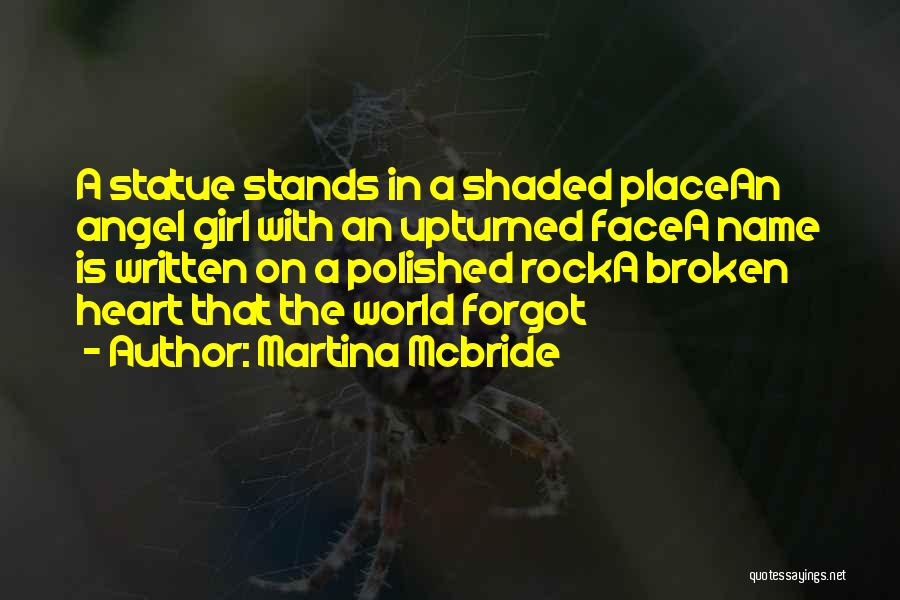 Martina Mcbride Quotes: A Statue Stands In A Shaded Placean Angel Girl With An Upturned Facea Name Is Written On A Polished Rocka