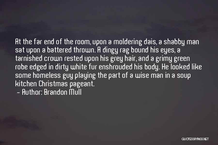 Brandon Mull Quotes: At The Far End Of The Room, Upon A Moldering Dais, A Shabby Man Sat Upon A Battered Thrown. A