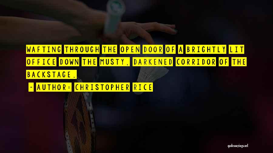 Christopher Rice Quotes: Wafting Through The Open Door Of A Brightly Lit Office Down The Musty, Darkened Corridor Of The Backstage.