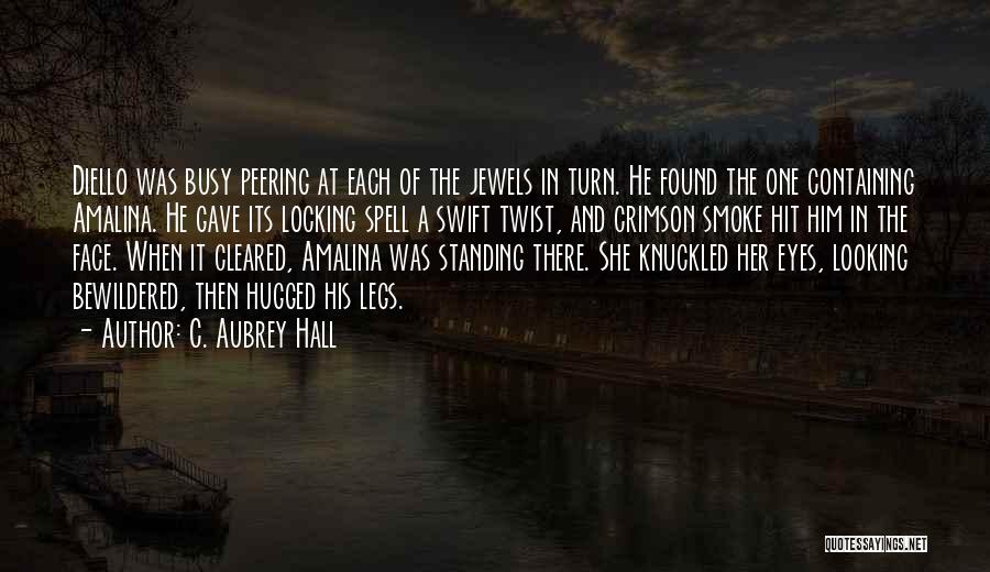 C. Aubrey Hall Quotes: Diello Was Busy Peering At Each Of The Jewels In Turn. He Found The One Containing Amalina. He Gave Its