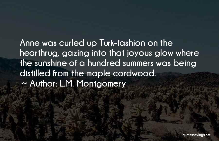 L.M. Montgomery Quotes: Anne Was Curled Up Turk-fashion On The Hearthrug, Gazing Into That Joyous Glow Where The Sunshine Of A Hundred Summers