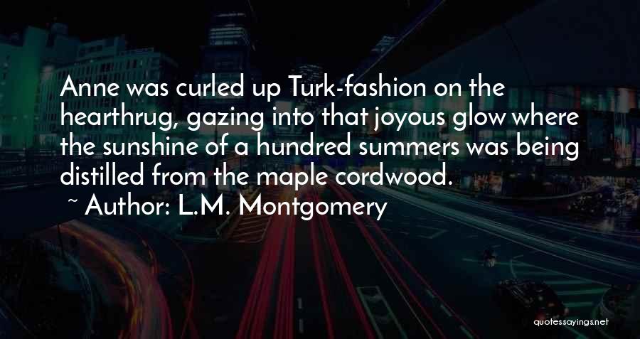 L.M. Montgomery Quotes: Anne Was Curled Up Turk-fashion On The Hearthrug, Gazing Into That Joyous Glow Where The Sunshine Of A Hundred Summers