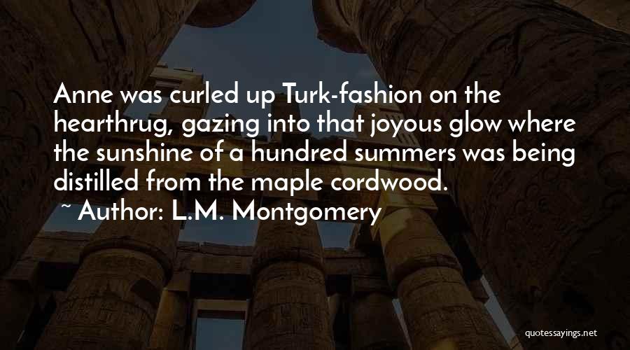 L.M. Montgomery Quotes: Anne Was Curled Up Turk-fashion On The Hearthrug, Gazing Into That Joyous Glow Where The Sunshine Of A Hundred Summers