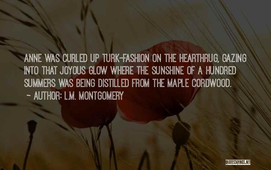 L.M. Montgomery Quotes: Anne Was Curled Up Turk-fashion On The Hearthrug, Gazing Into That Joyous Glow Where The Sunshine Of A Hundred Summers