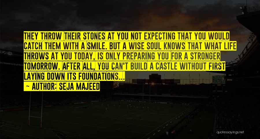 Seja Majeed Quotes: They Throw Their Stones At You Not Expecting That You Would Catch Them With A Smile. But A Wise Soul