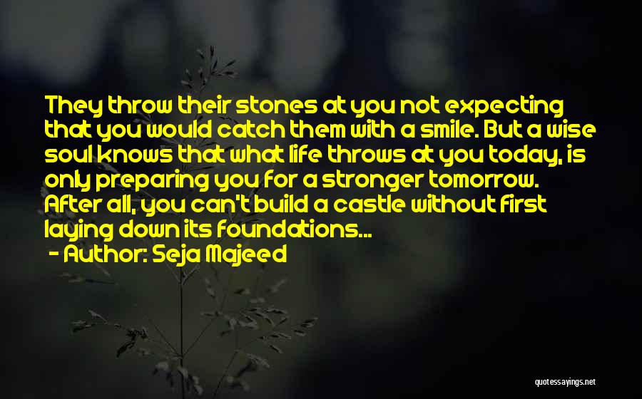 Seja Majeed Quotes: They Throw Their Stones At You Not Expecting That You Would Catch Them With A Smile. But A Wise Soul