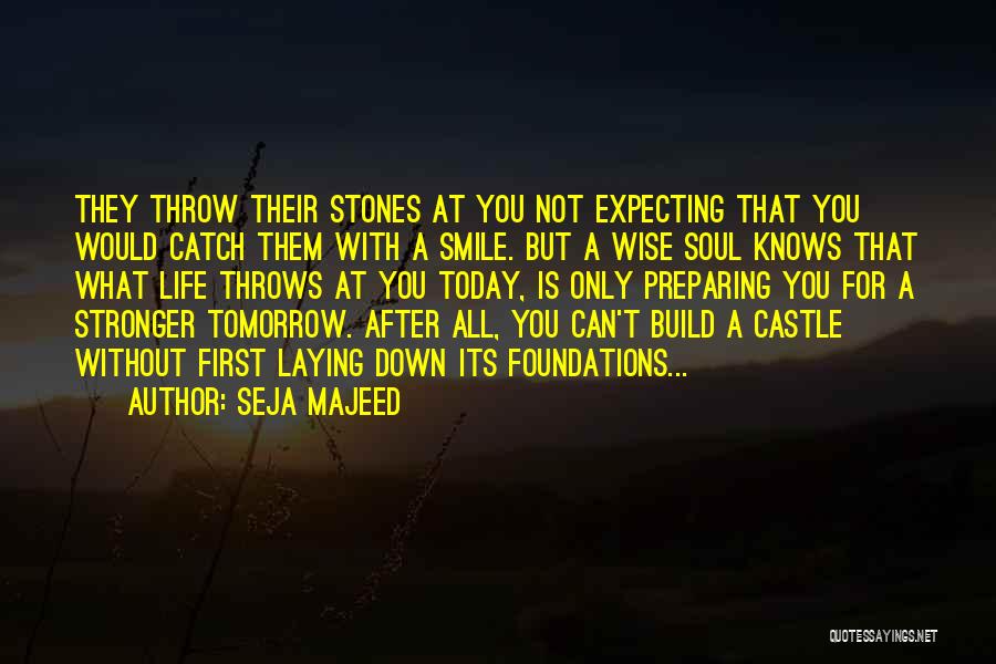 Seja Majeed Quotes: They Throw Their Stones At You Not Expecting That You Would Catch Them With A Smile. But A Wise Soul