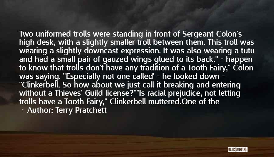 Terry Pratchett Quotes: Two Uniformed Trolls Were Standing In Front Of Sergeant Colon's High Desk, With A Slightly Smaller Troll Between Them. This