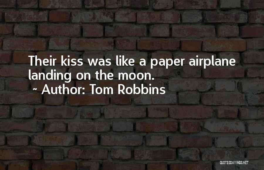 Tom Robbins Quotes: Their Kiss Was Like A Paper Airplane Landing On The Moon.