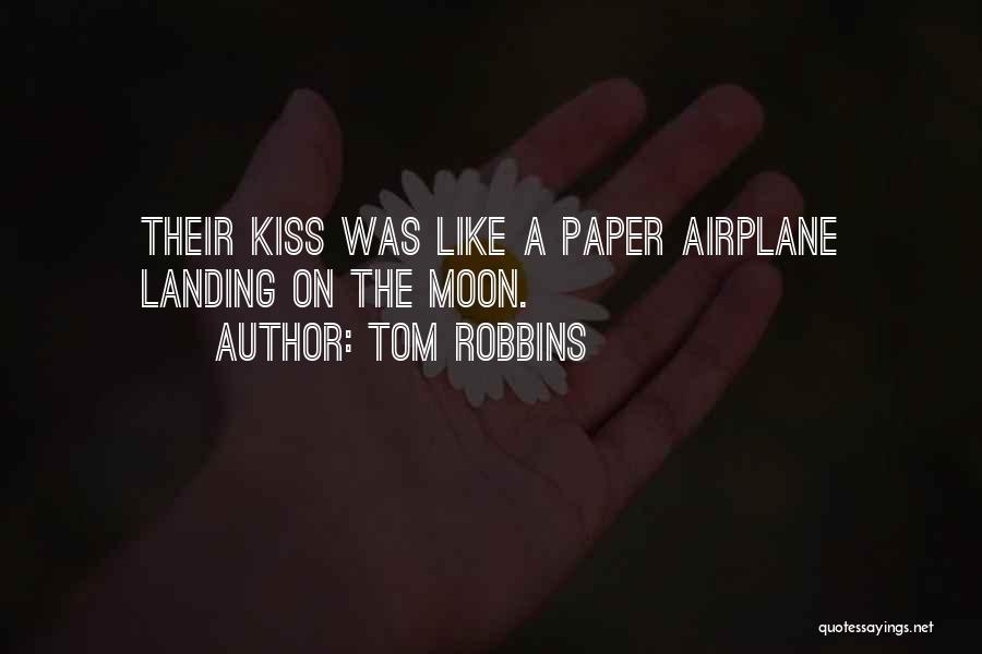 Tom Robbins Quotes: Their Kiss Was Like A Paper Airplane Landing On The Moon.