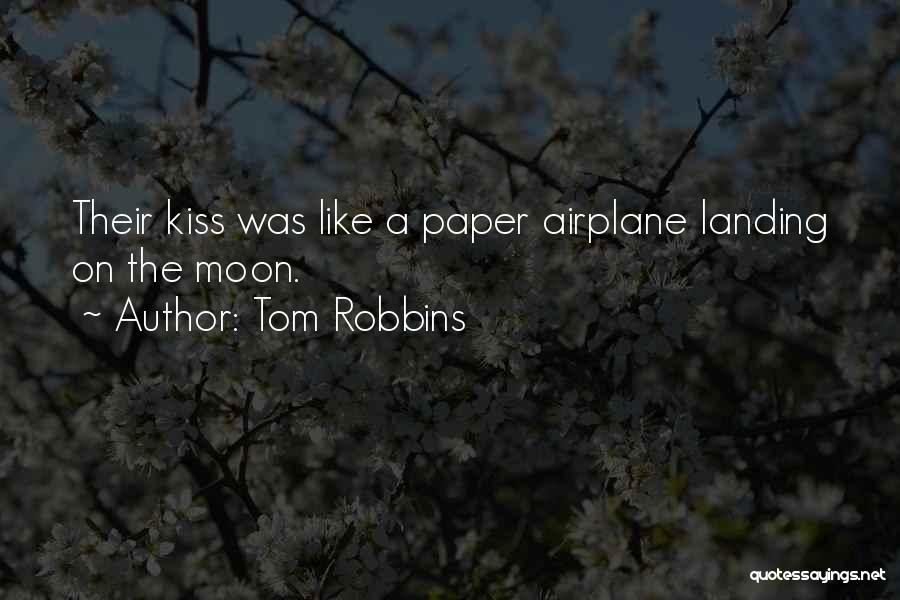 Tom Robbins Quotes: Their Kiss Was Like A Paper Airplane Landing On The Moon.