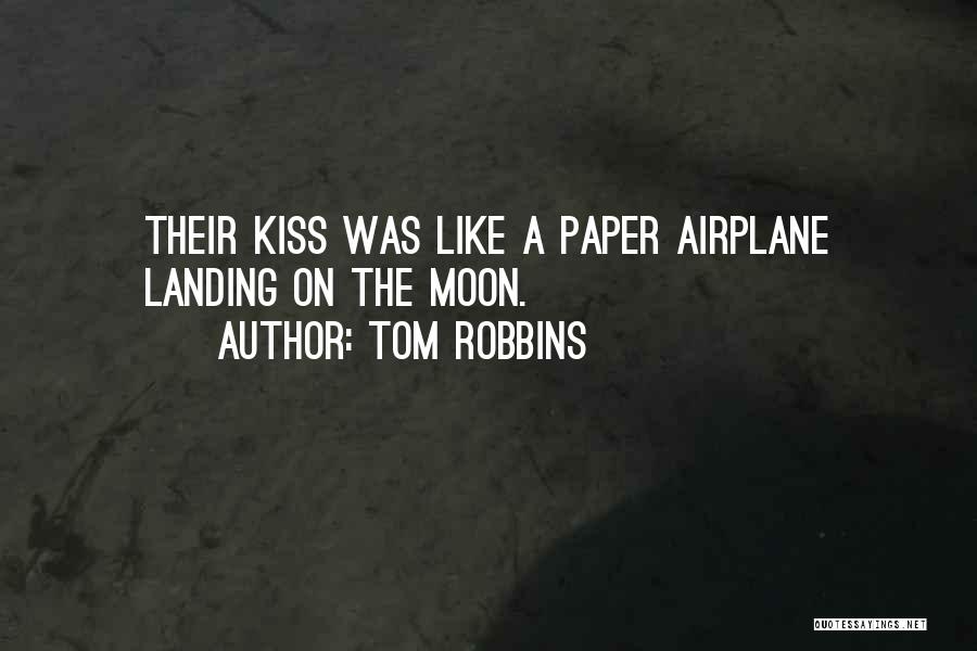 Tom Robbins Quotes: Their Kiss Was Like A Paper Airplane Landing On The Moon.