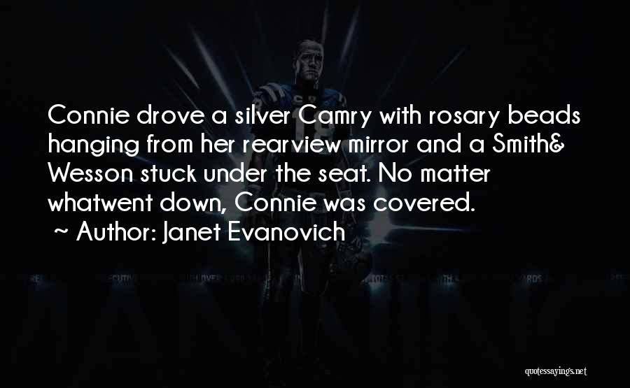 Janet Evanovich Quotes: Connie Drove A Silver Camry With Rosary Beads Hanging From Her Rearview Mirror And A Smith& Wesson Stuck Under The