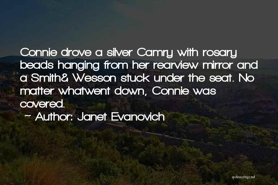 Janet Evanovich Quotes: Connie Drove A Silver Camry With Rosary Beads Hanging From Her Rearview Mirror And A Smith& Wesson Stuck Under The