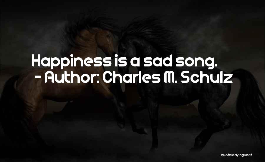 Charles M. Schulz Quotes: Happiness Is A Sad Song.
