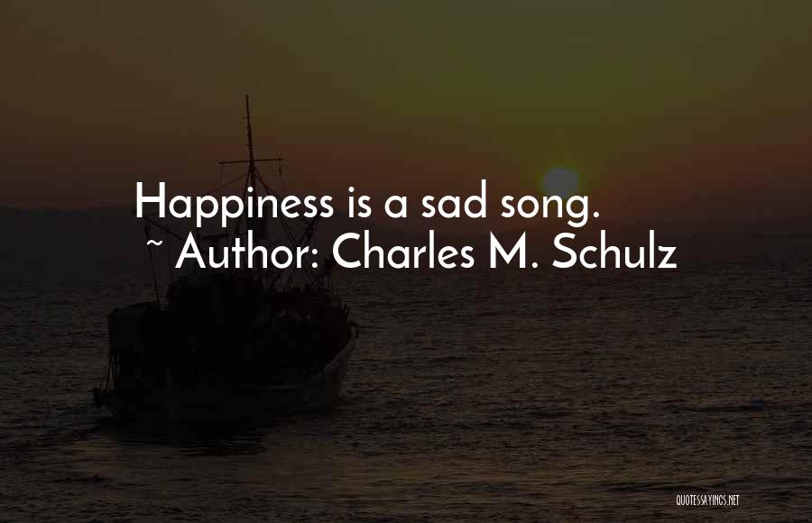 Charles M. Schulz Quotes: Happiness Is A Sad Song.