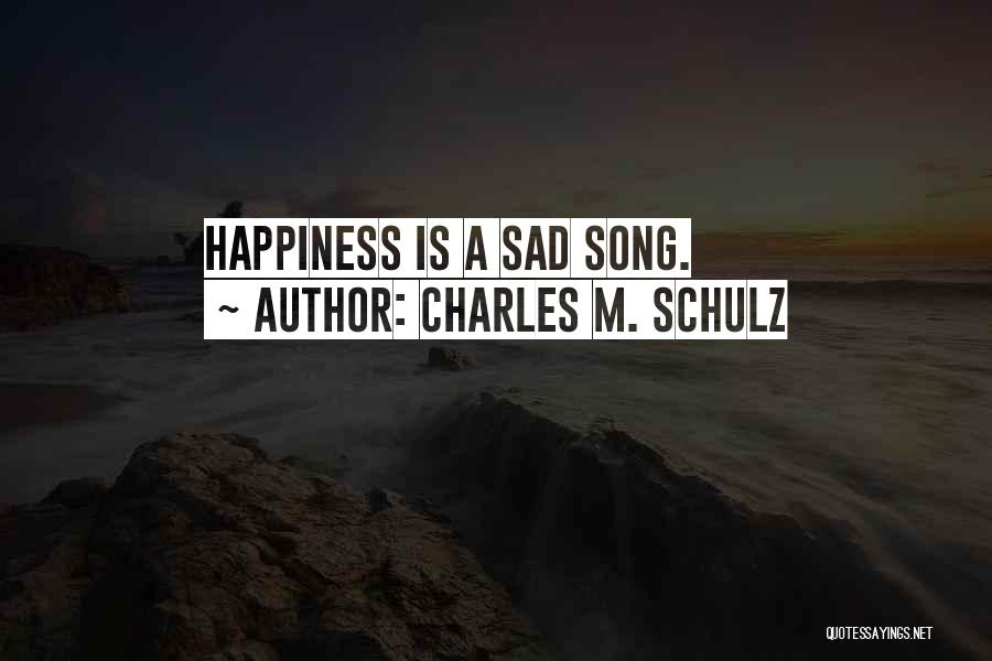 Charles M. Schulz Quotes: Happiness Is A Sad Song.