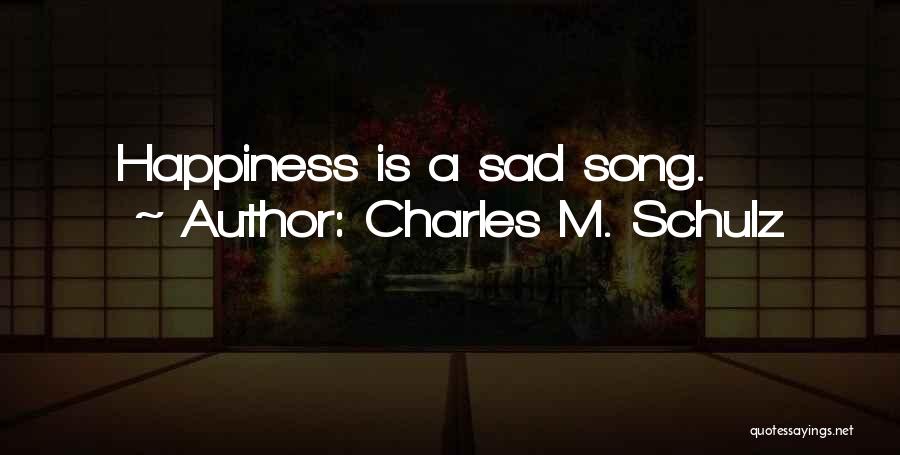 Charles M. Schulz Quotes: Happiness Is A Sad Song.