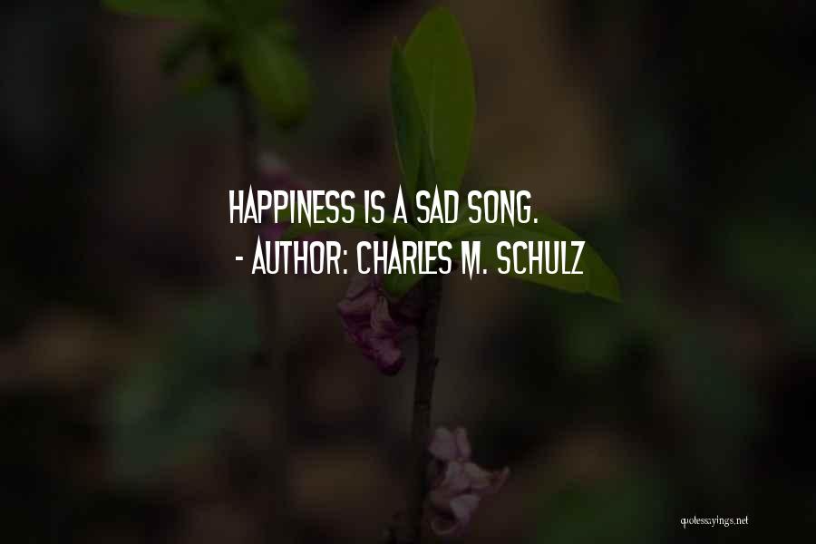 Charles M. Schulz Quotes: Happiness Is A Sad Song.