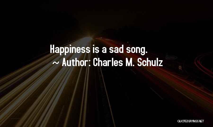 Charles M. Schulz Quotes: Happiness Is A Sad Song.