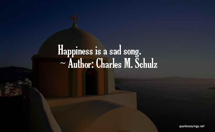 Charles M. Schulz Quotes: Happiness Is A Sad Song.