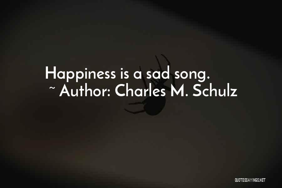 Charles M. Schulz Quotes: Happiness Is A Sad Song.