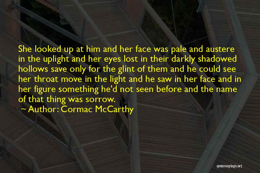 Cormac McCarthy Quotes: She Looked Up At Him And Her Face Was Pale And Austere In The Uplight And Her Eyes Lost In