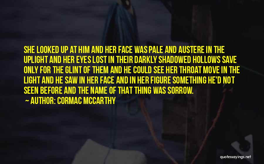 Cormac McCarthy Quotes: She Looked Up At Him And Her Face Was Pale And Austere In The Uplight And Her Eyes Lost In