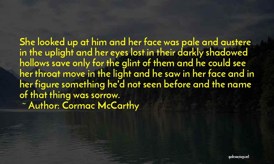 Cormac McCarthy Quotes: She Looked Up At Him And Her Face Was Pale And Austere In The Uplight And Her Eyes Lost In