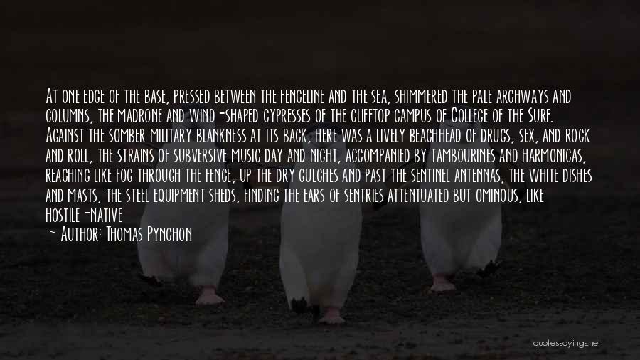 Thomas Pynchon Quotes: At One Edge Of The Base, Pressed Between The Fenceline And The Sea, Shimmered The Pale Archways And Columns, The