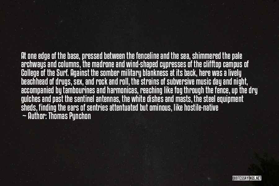 Thomas Pynchon Quotes: At One Edge Of The Base, Pressed Between The Fenceline And The Sea, Shimmered The Pale Archways And Columns, The