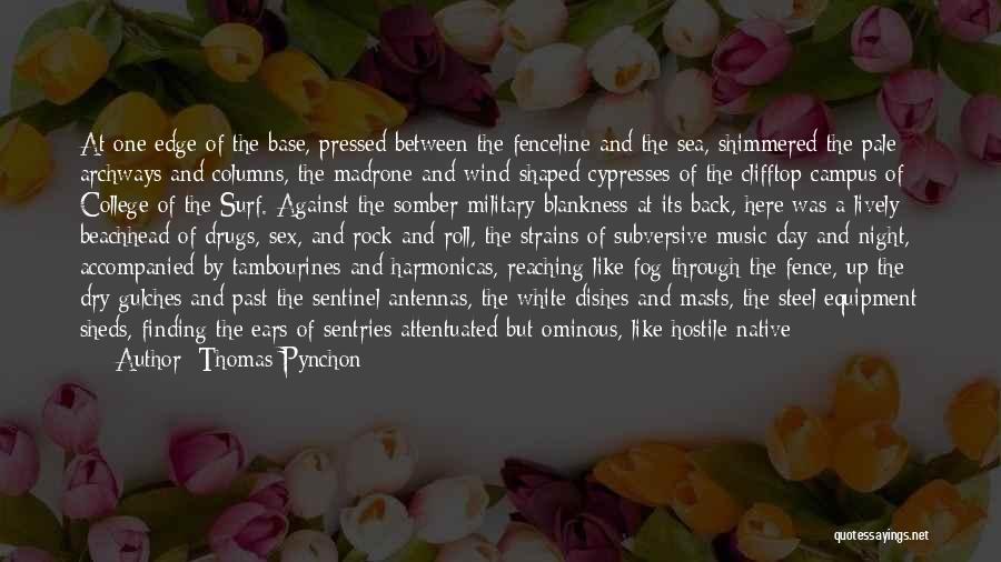 Thomas Pynchon Quotes: At One Edge Of The Base, Pressed Between The Fenceline And The Sea, Shimmered The Pale Archways And Columns, The