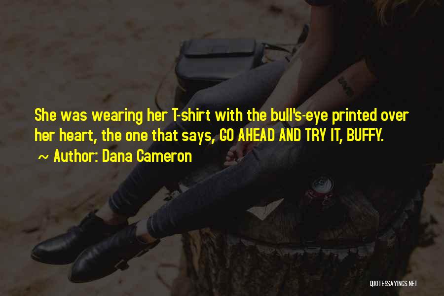 Dana Cameron Quotes: She Was Wearing Her T-shirt With The Bull's-eye Printed Over Her Heart, The One That Says, Go Ahead And Try